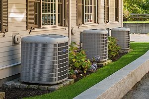 an outdoor AC unit that needs service repairs from an HVAC contractor