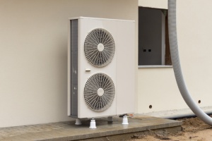 heat pump outside house with cooling system