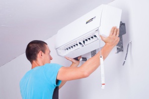 HVAC technician conduction a full AC