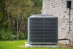 an energy efficient hvac system in the backyard of a home