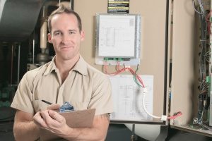 HVAC technician who is ready to conduct an AC repair or replacement for some Maryland homeowners