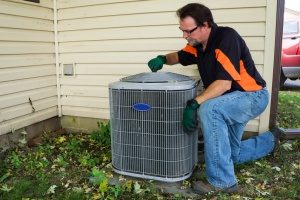 Gaithersburg, MD hvac contractor doing maintenance work on an air conditioning unit