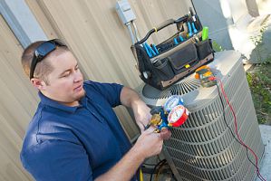 hvac technician installing an new energy efficient HVAC system