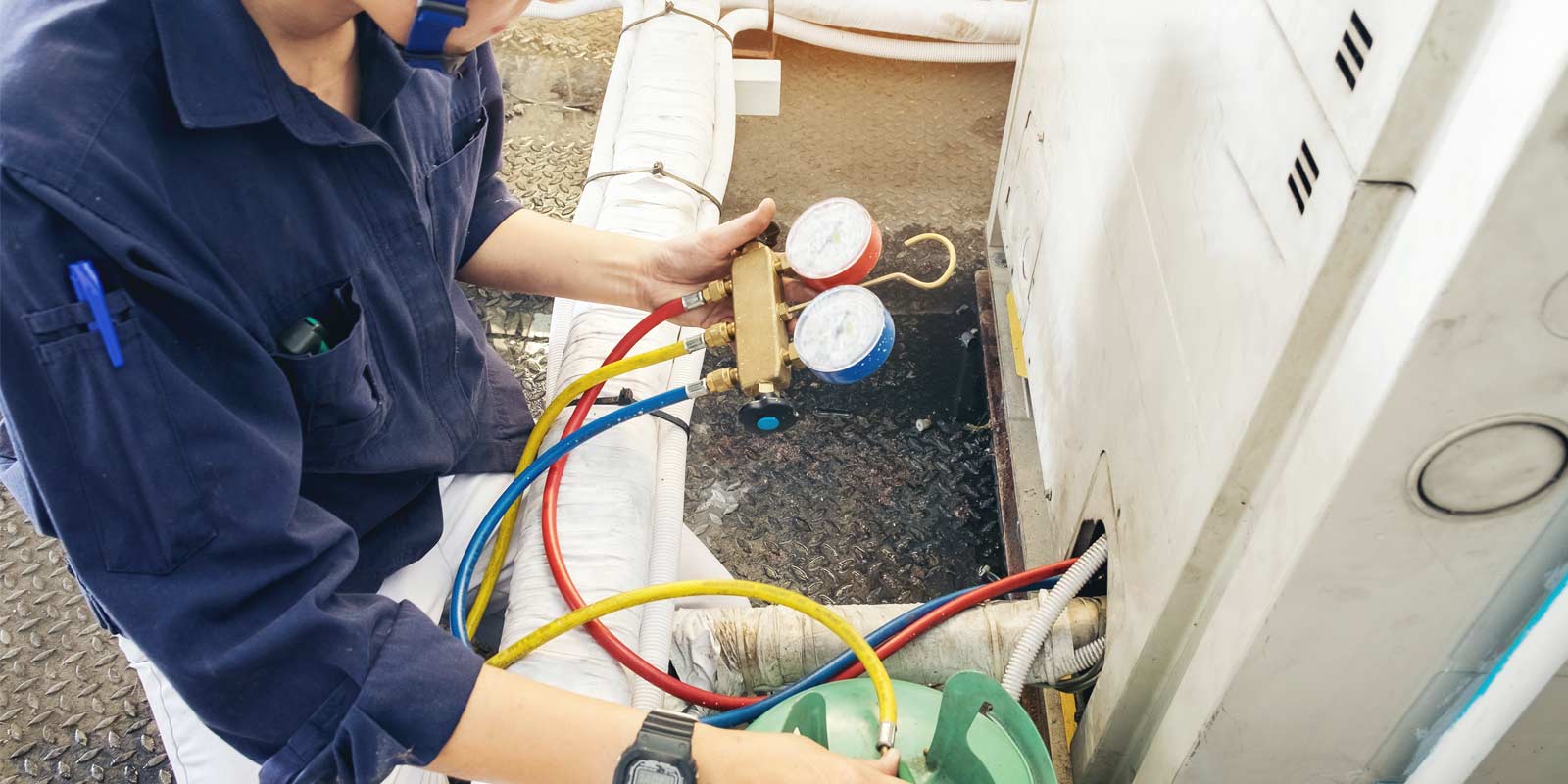 technician repairing the HVAC wiring