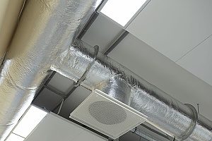 routine air duct cleaning and HVAC maintenance being performed on commercial air ducts since their is a large dust buildup in the office space