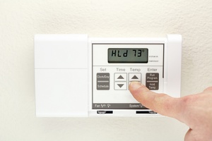 person using an energy efficient air conditioner