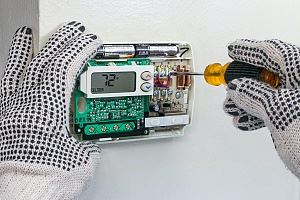 technician repairing the controller