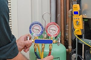 an HVAC contractor performing routine maintenance on a heating system for a homeowner in Gaithersburg, MD