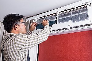 regularly scheduled HVAC maintenance being performed by a contractor that the homeowners may enjoy safe air and good indoor air quality
