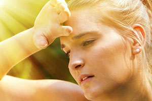 Woman sweating in need of ac repair