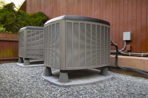 a residential hvac system unit next to a house