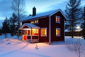 picture of houses in the winter using forced air furnaces for heat 